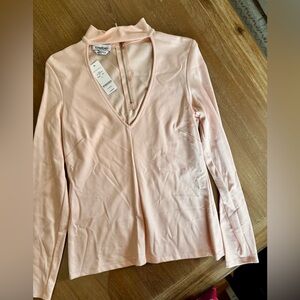 New Bebe chick top size large bebe Pink V-Neck Pullover Top